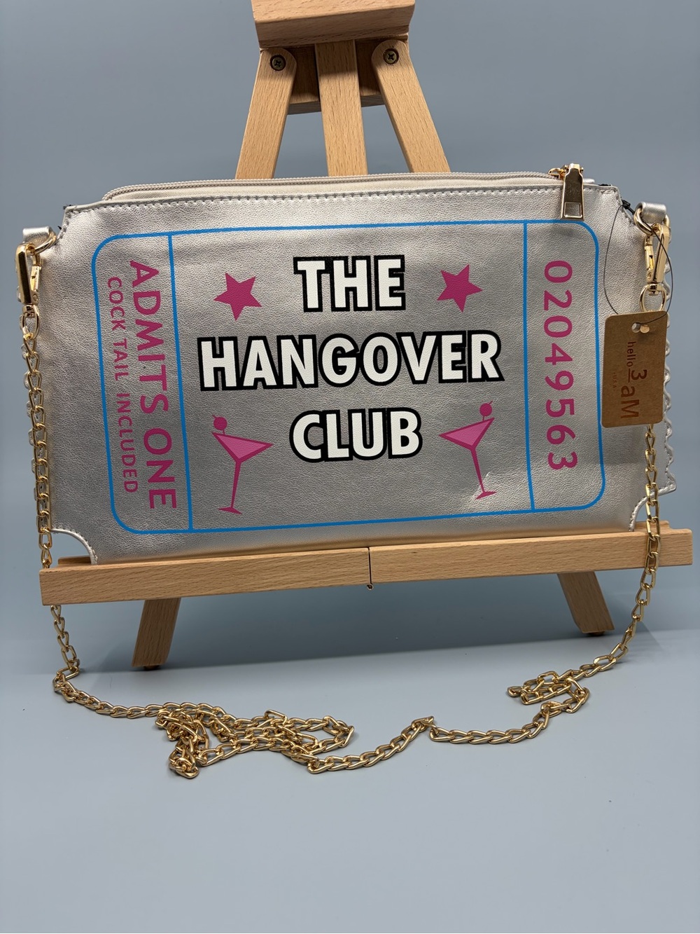 The Hangover Club Metallic Silver Crossbody Bag with Gold Chain